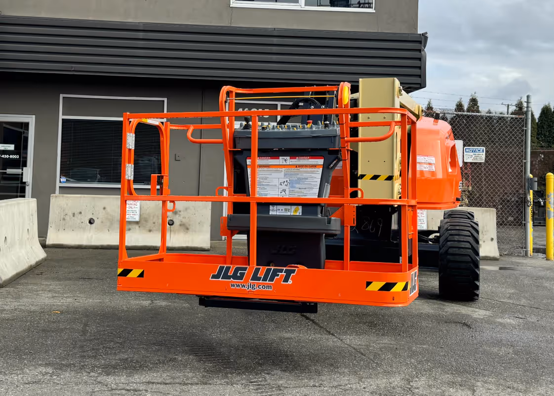 JLG 450AJ articulating boom lift close-up of platform basket in Canada