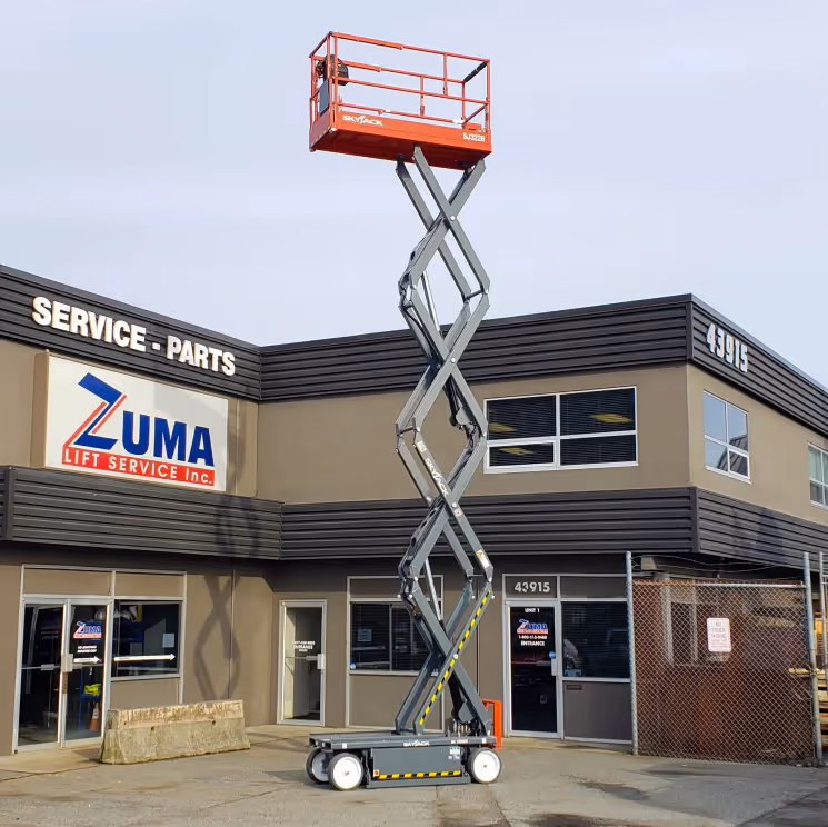 Skyjack SJ3226 scissor lift fully extended at maximum height in Canada
