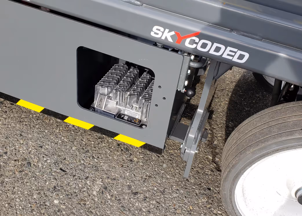 Skyjack SJ3226 electrical control module close-up near base in Canada