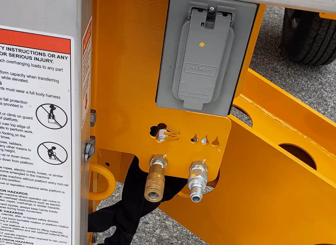 Haulotte 5533A boom lift utility connections and outlet port in Canada