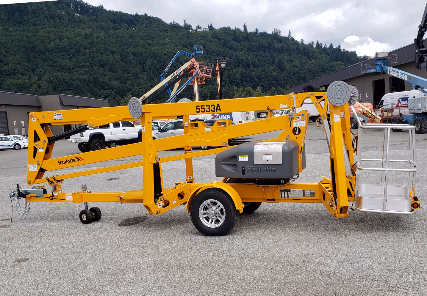 Haulotte 5533A towable boom lift right side profile view in Canada