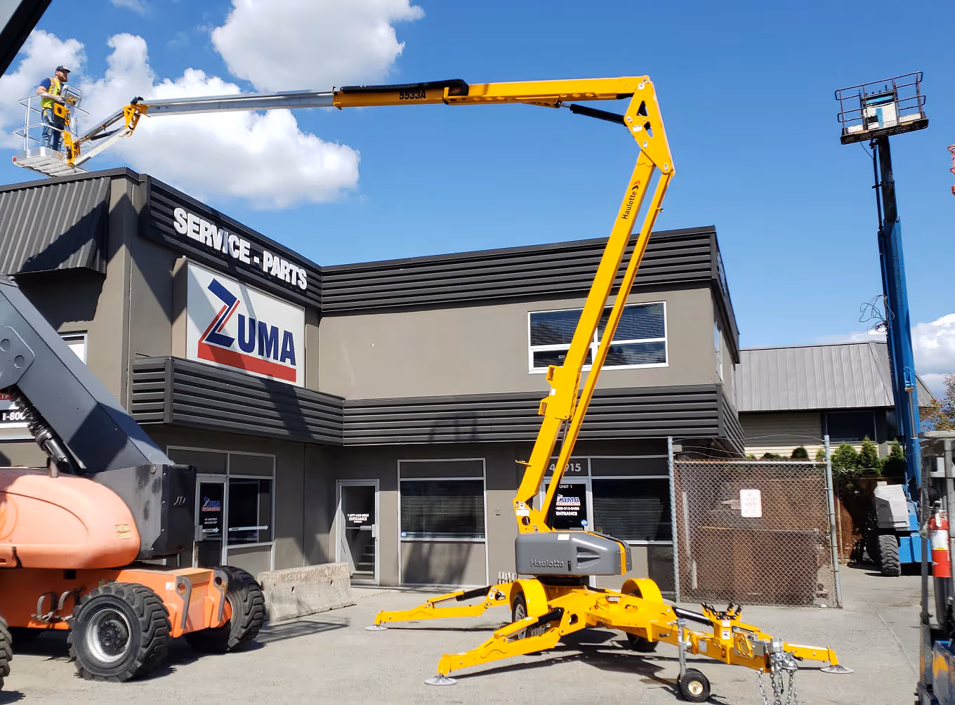 Haulotte 5533A boom lift fully extended during operation in Canada