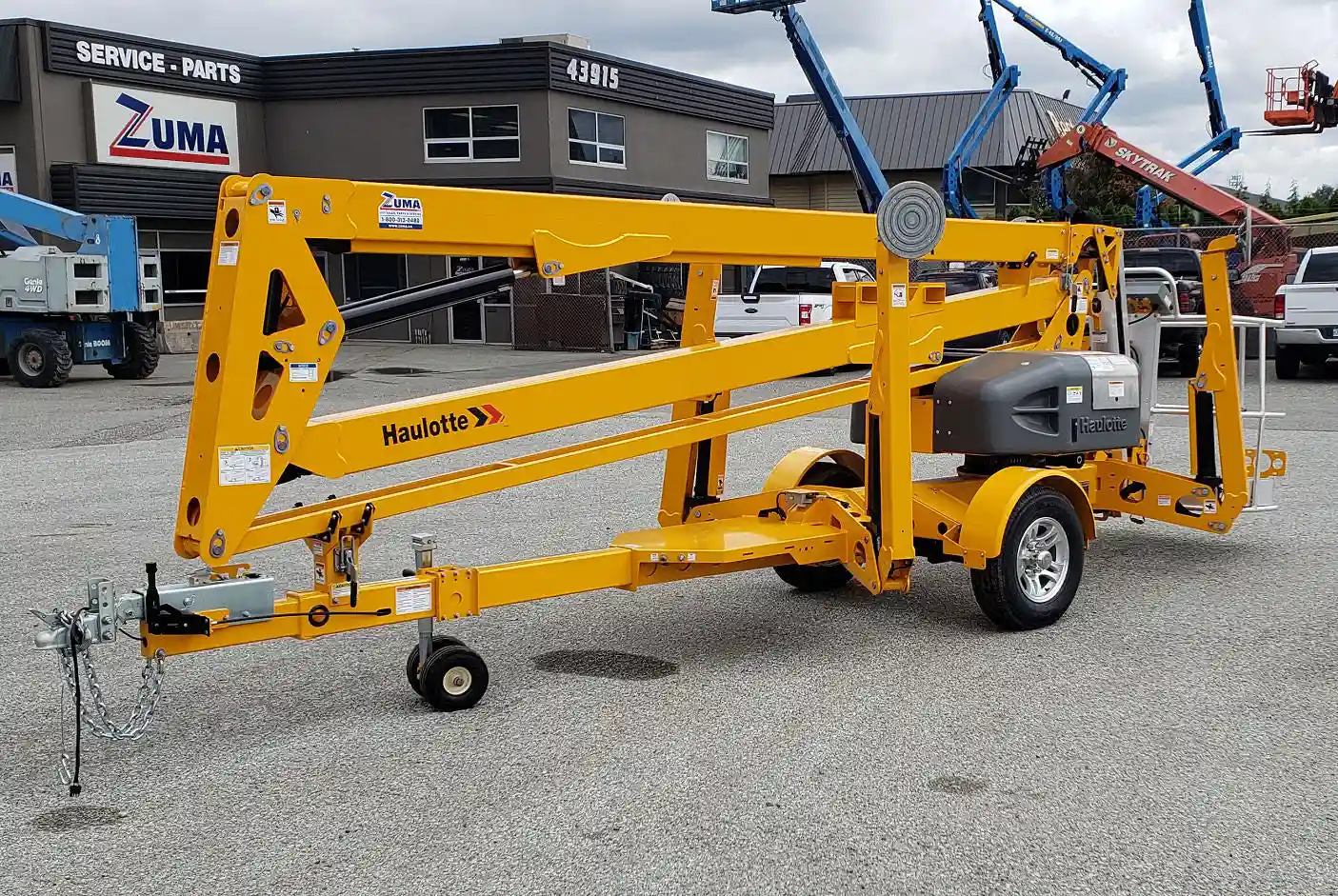 Haulotte 5533A towable boom lift front hitch and arm folded in Canada