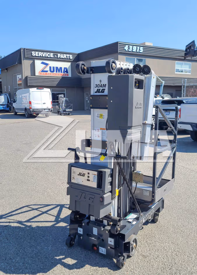 JLG 30AM personnel lift back view showing mast label and wheels in Canada