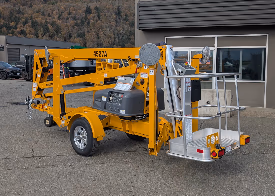 Haulotte 4527A towable boom lift rear angled view in Canada