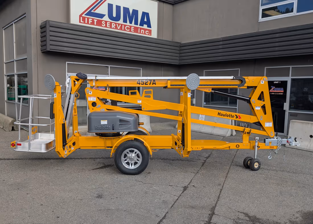 Haulotte 4527A towable boom lift stowed for transport in Canada