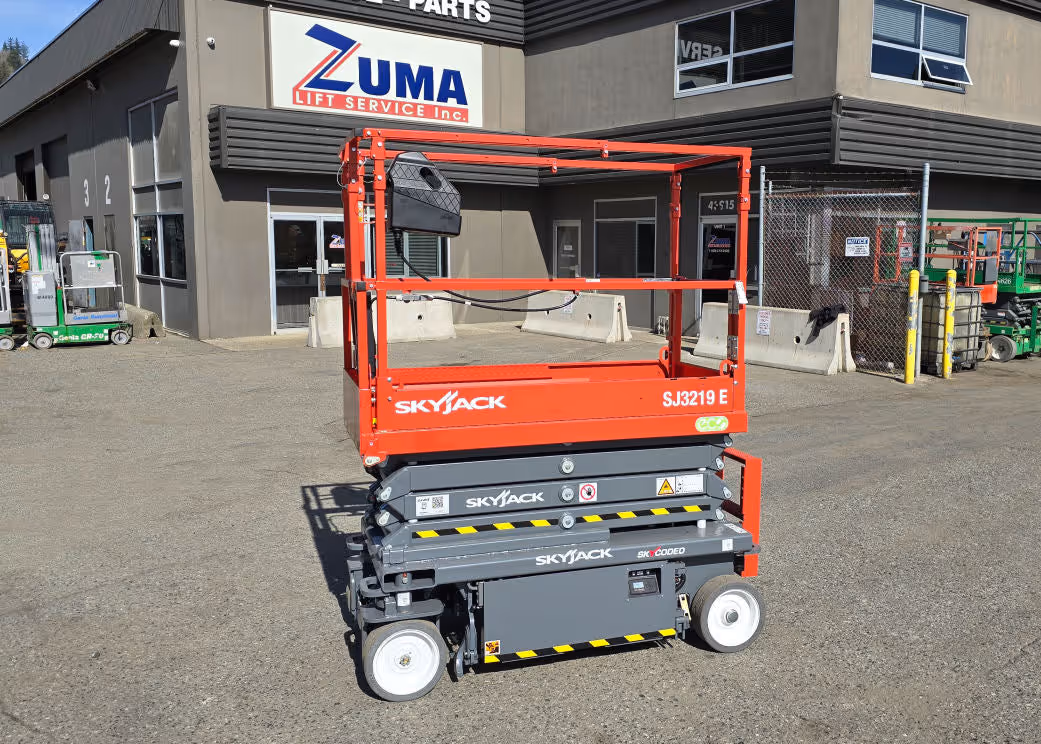 Side profile of Skyjack SJ3219 E electric scissor lift in Canada
