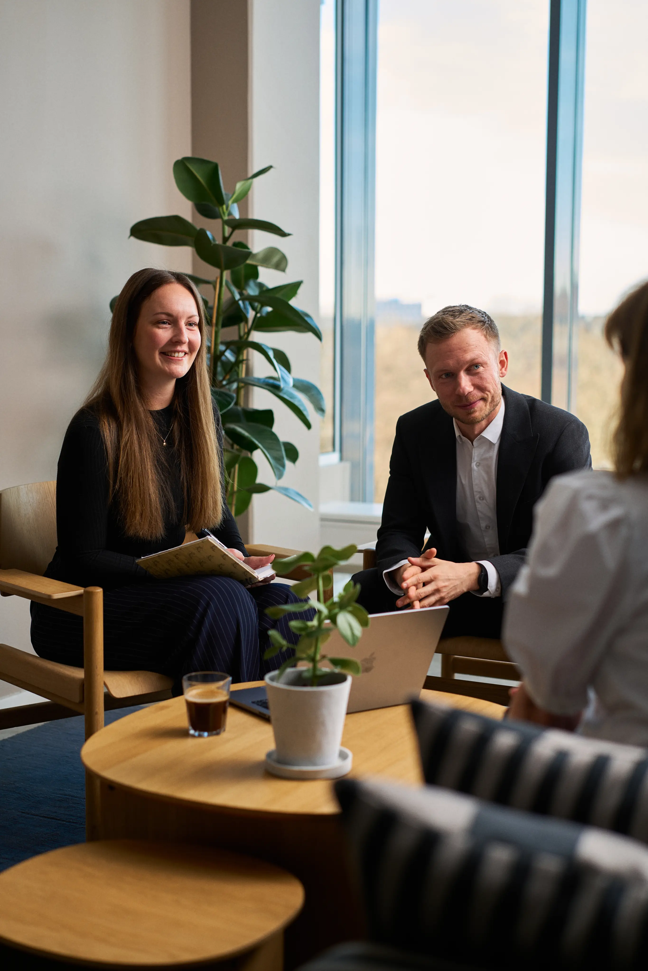 People sitting around having a meeting