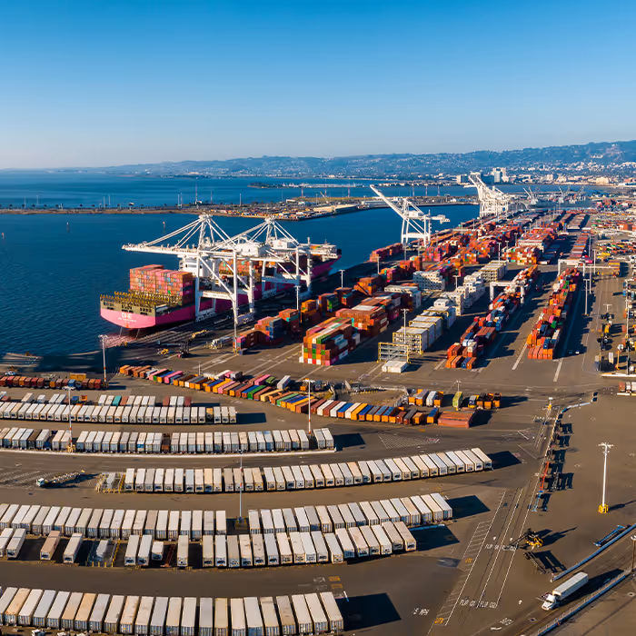 overhead view of very large busy port cargo shipping yard