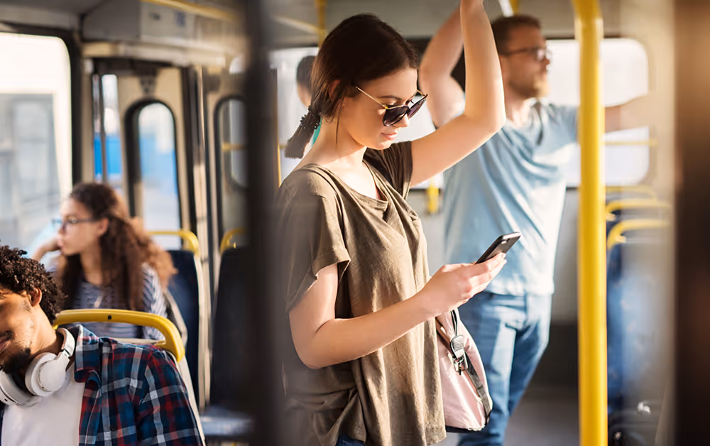 university students riding public transit bus