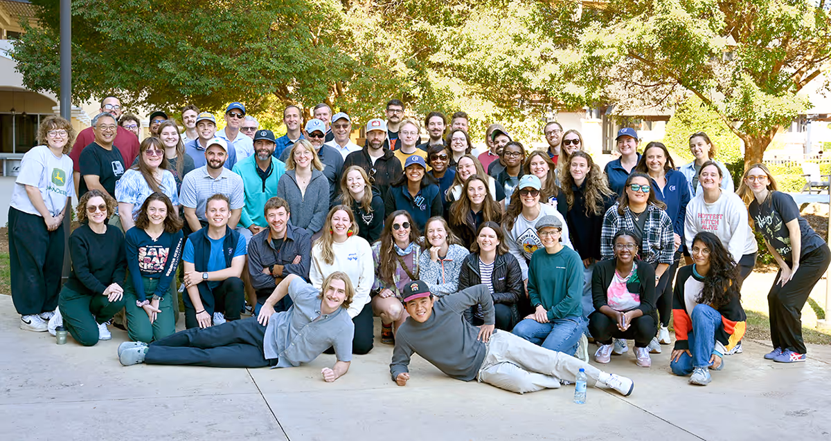 large group of CTE employees standing outside in a group photo