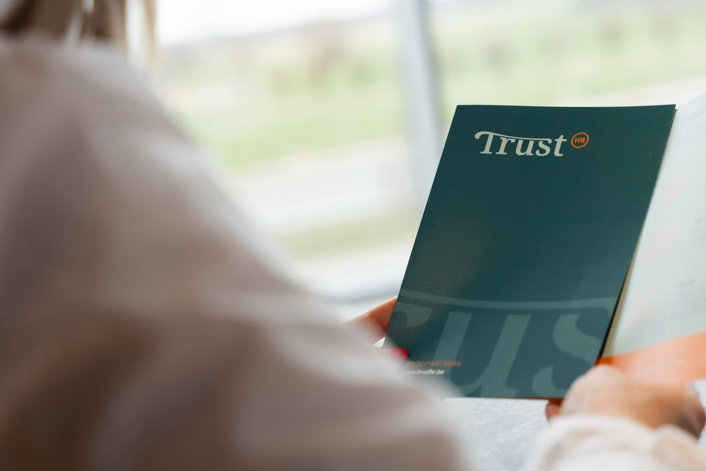 A lady picked up a brochure