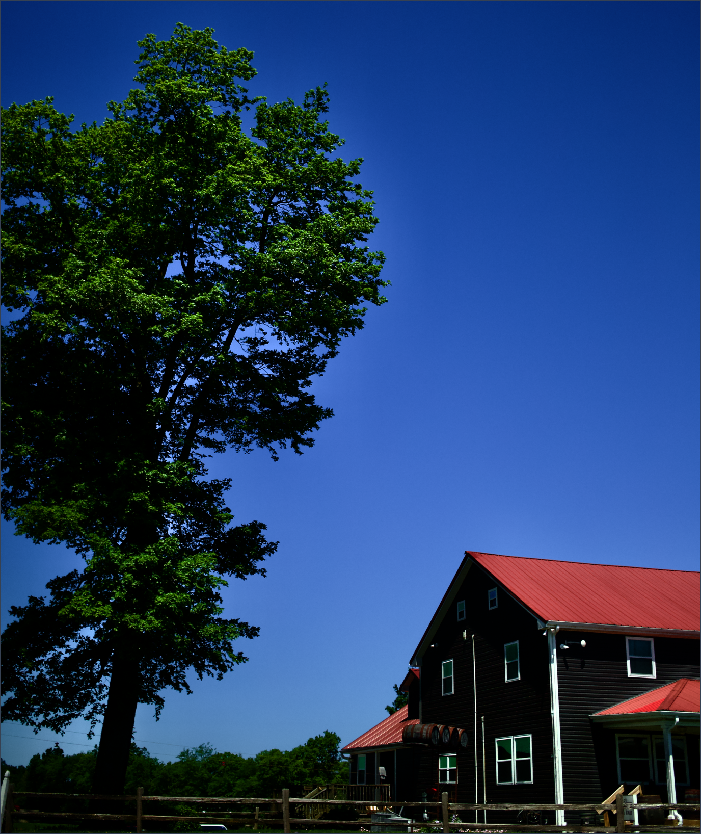 The family-owned, artisanal craft distillery in rural Kentucky where Luminance single barrel bourbon is made on a clear day.