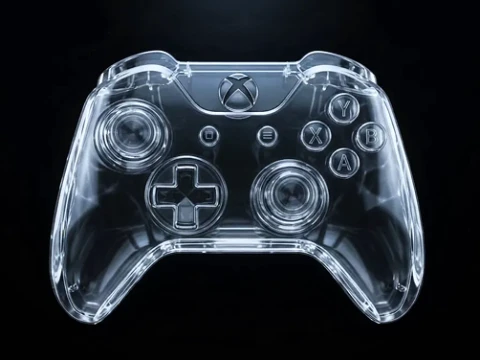 Transparent Xbox-style video game controller with visible buttons and joystick outlines on a black background.