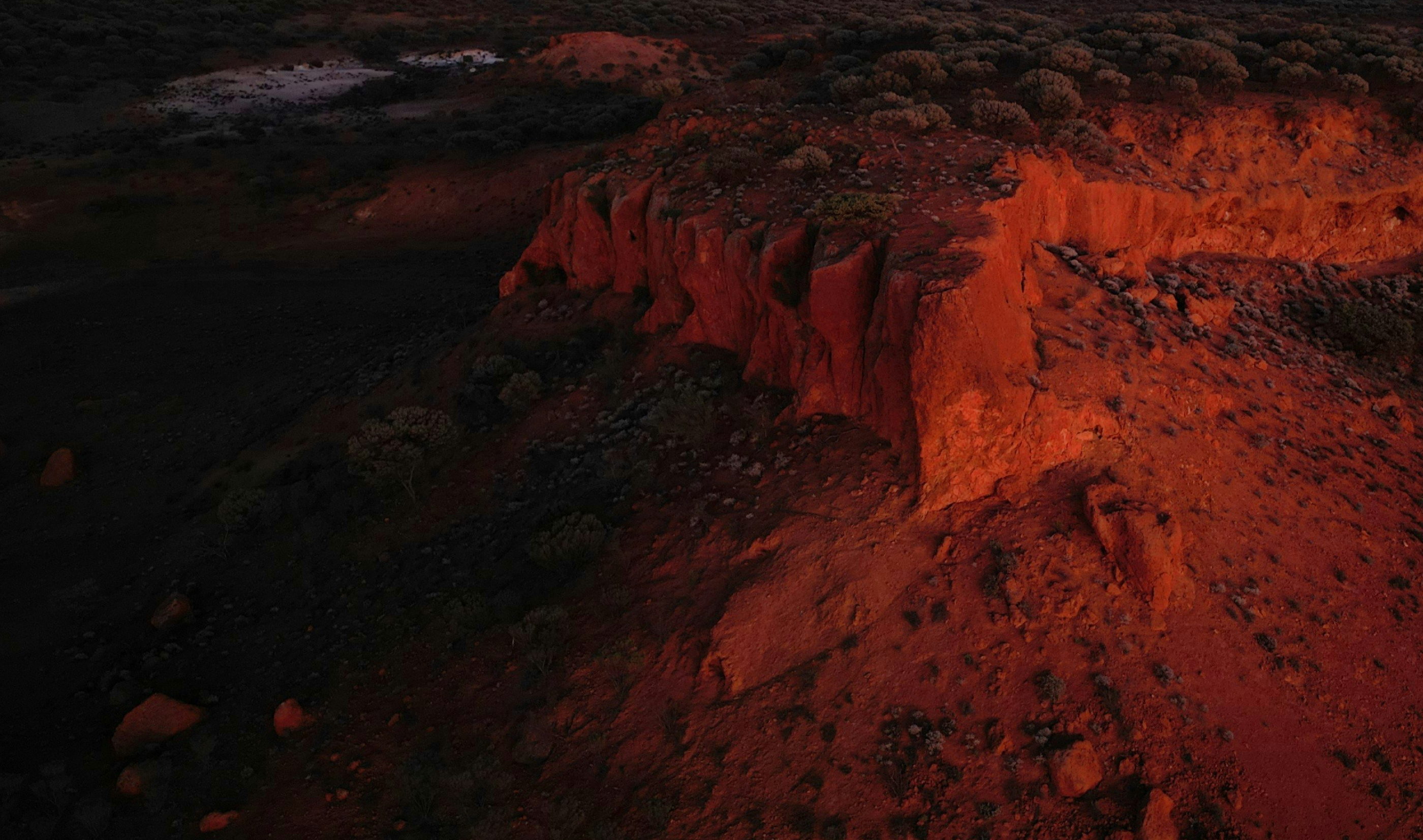 Aerial view of red mine terrain