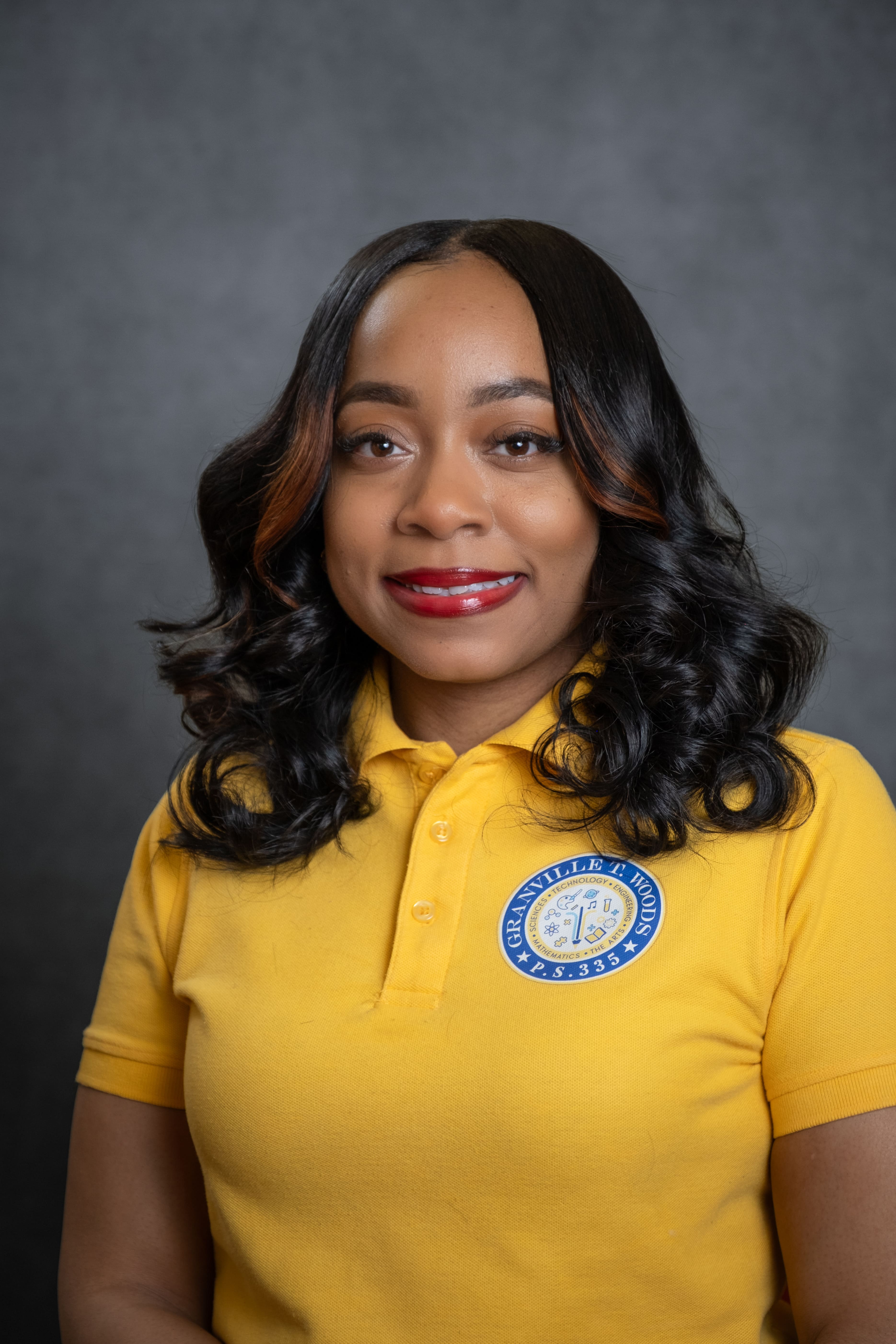 Staff member D. Prince in Granville T. Woods P.S. 335 uniform