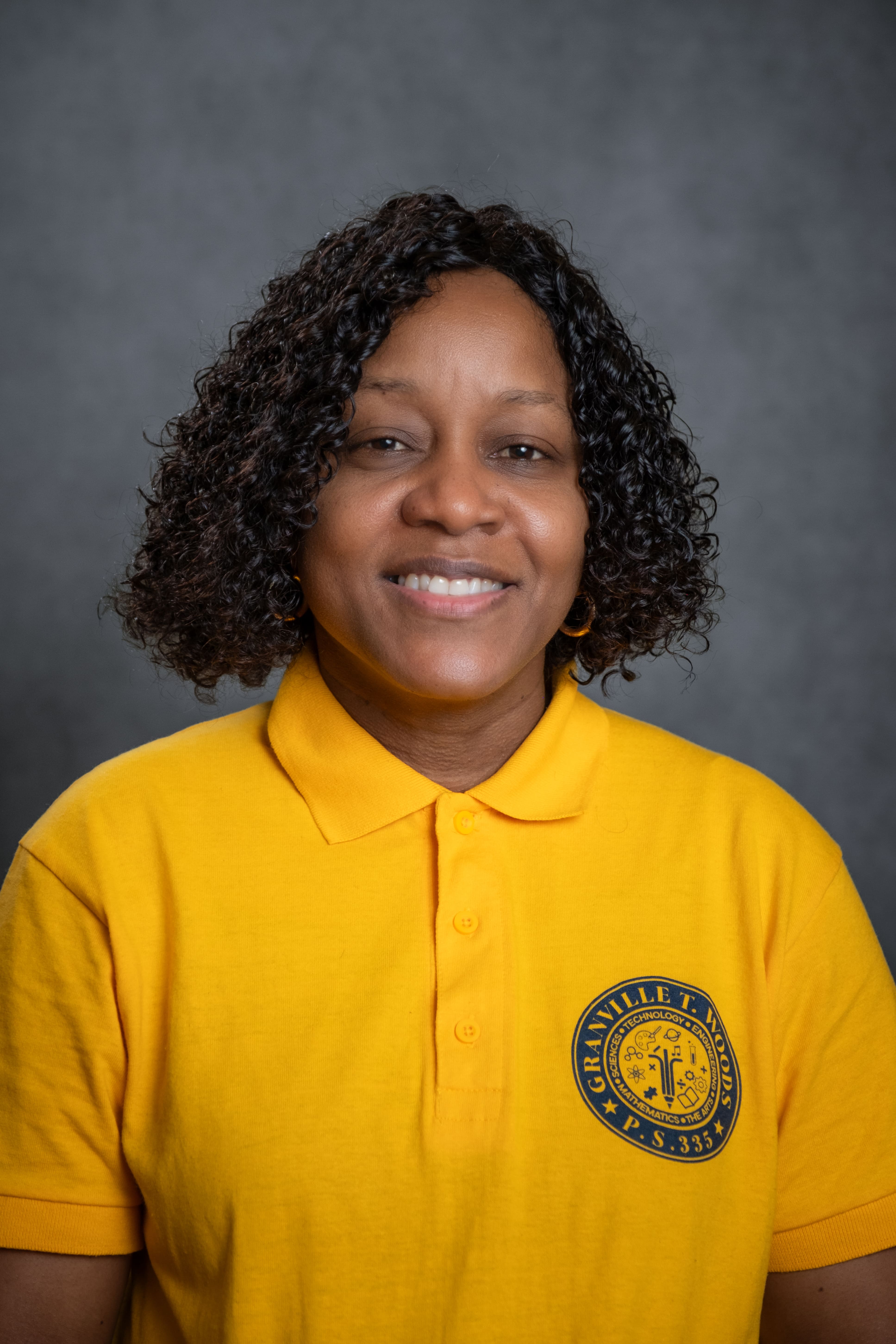 T. Oliver-Graham PS 335 staff member in school polo shirt