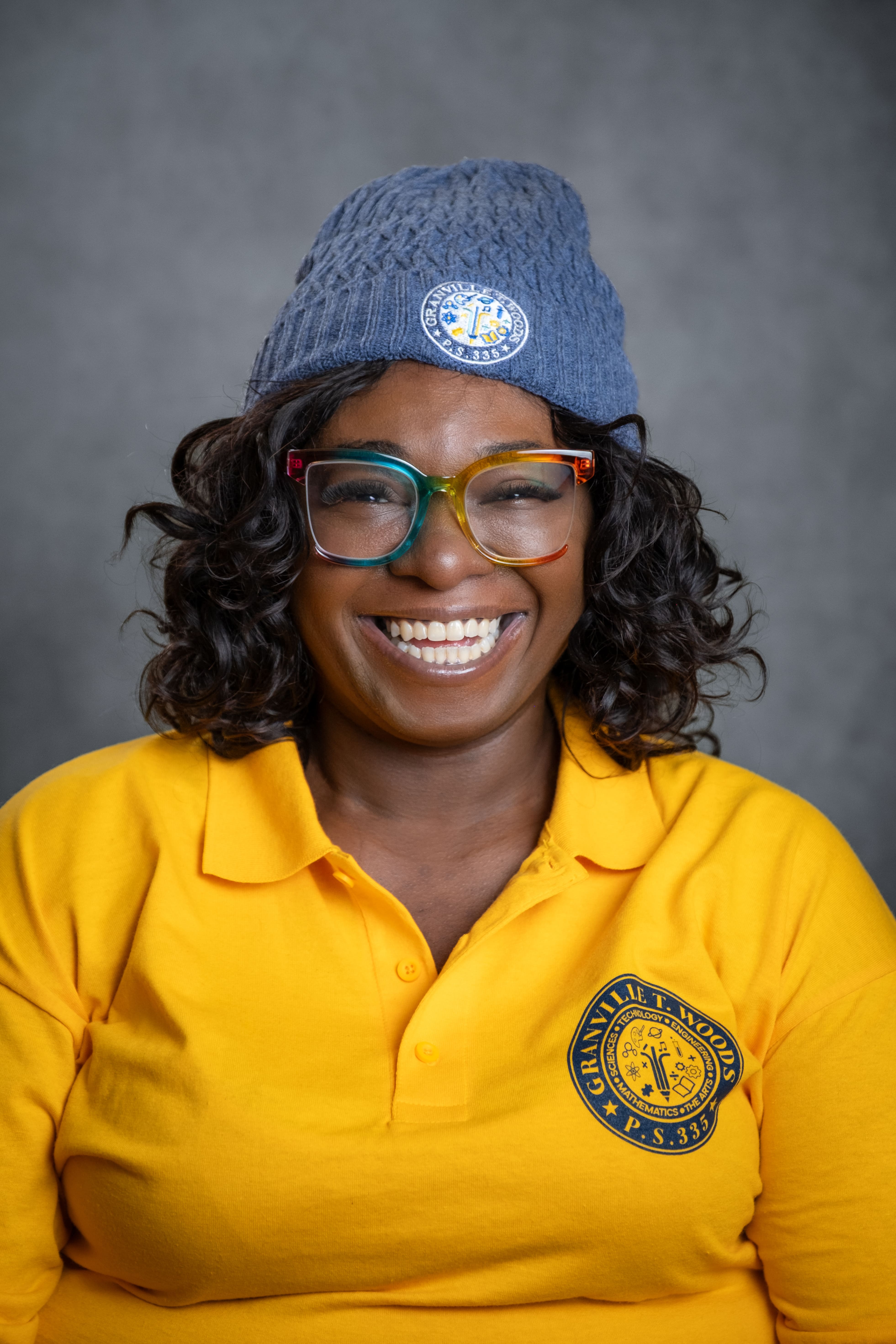 Smiling Granville T. Woods PS 335 staff member E. Wilson