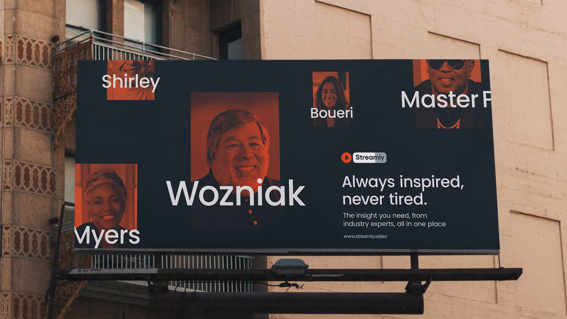 A billboard with the words "Always inspired, never tired" as the header. Headshots of celebrities alongside their surname are placed around the billboard.