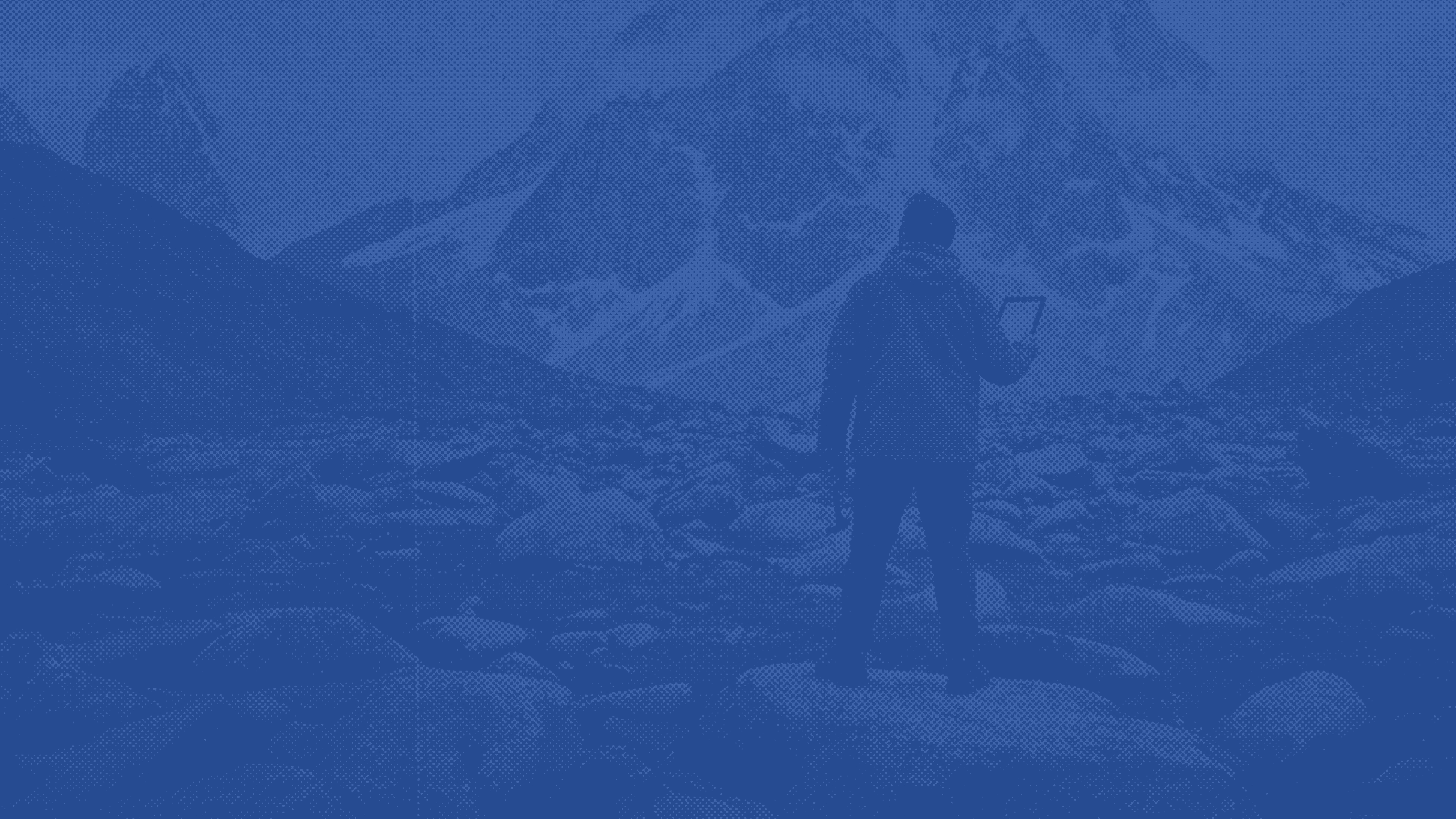 Worker installing or repairing roof shingles, shown in a blue duotone filter.