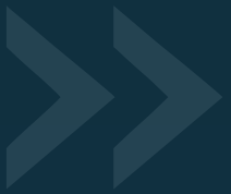 Double right-pointing arrow icon in dark blue tones.