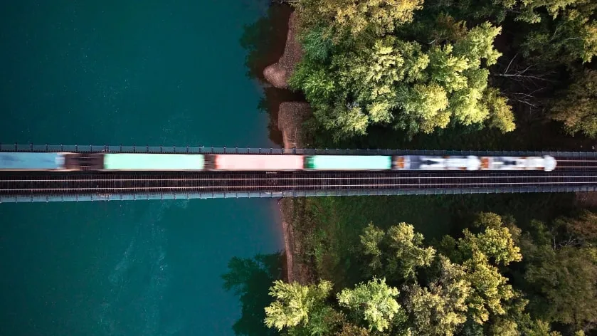 The train is running across the bridge.