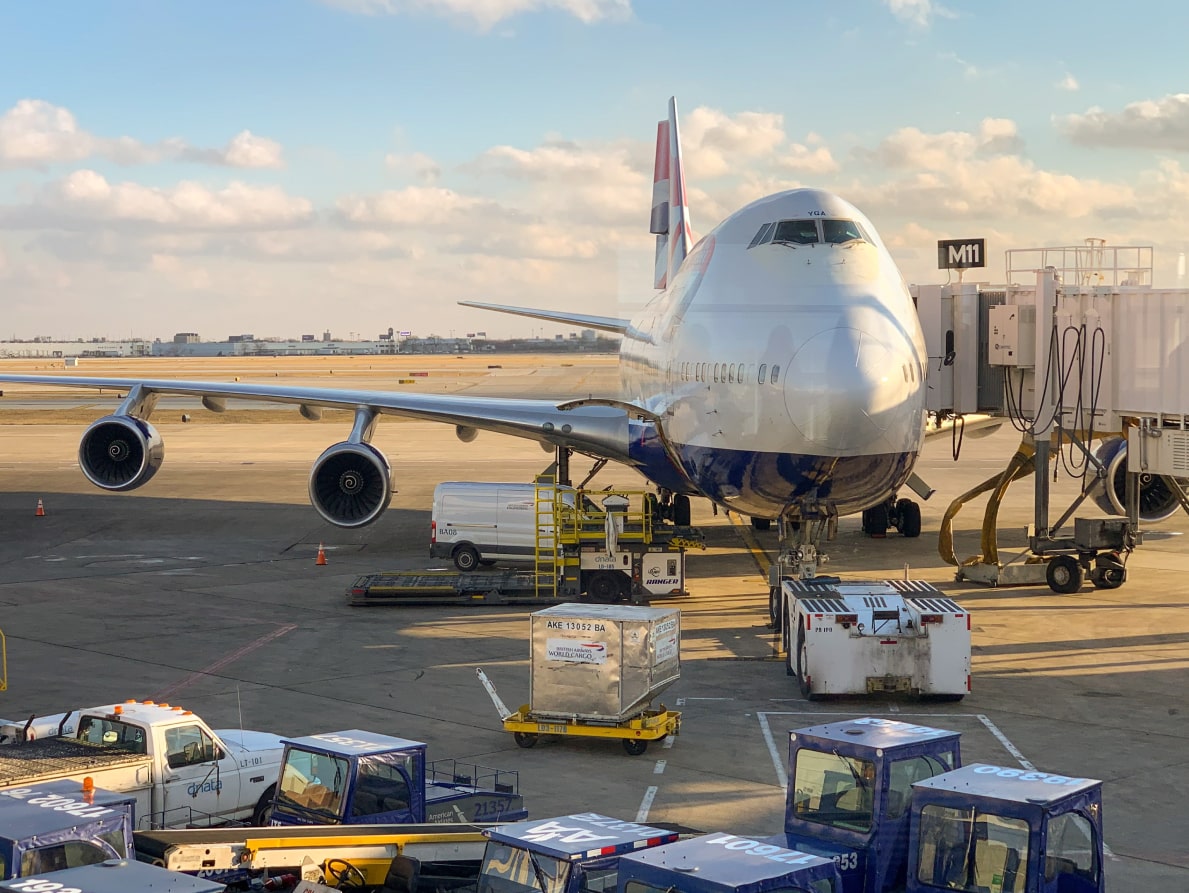 a large jetliner sitting on top of an airport tarmac