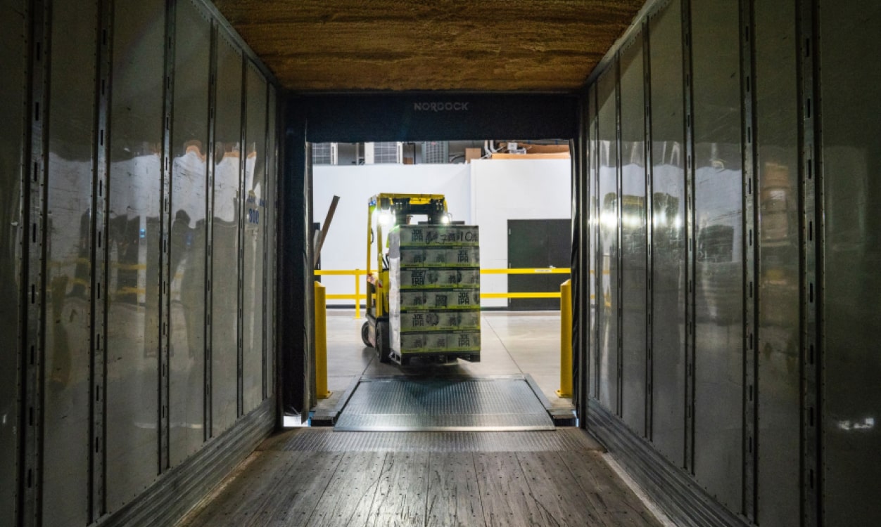 a large stack of stacks of money in a storage area