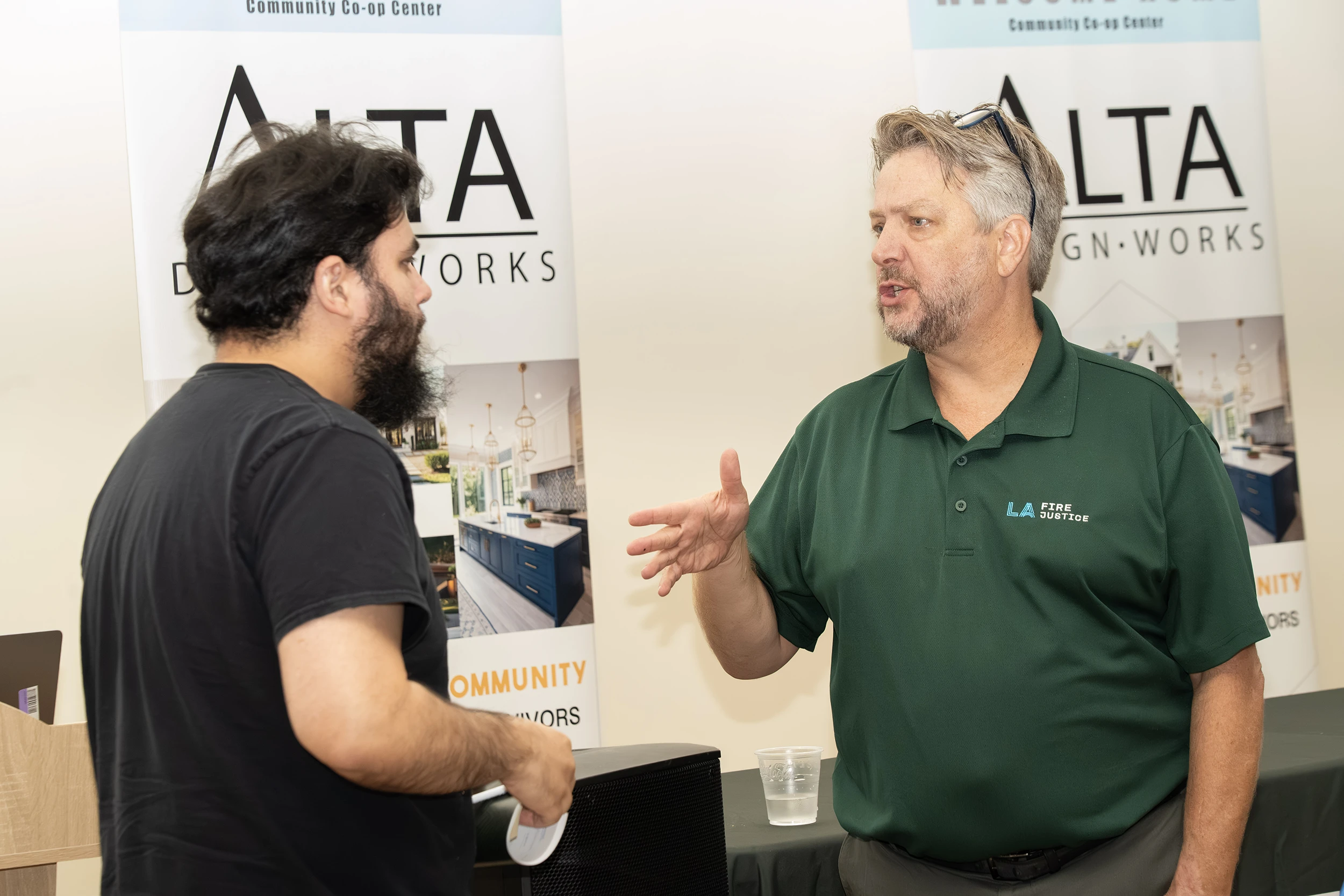 Harold De Louise from LA Fire Justice is talking with a client 