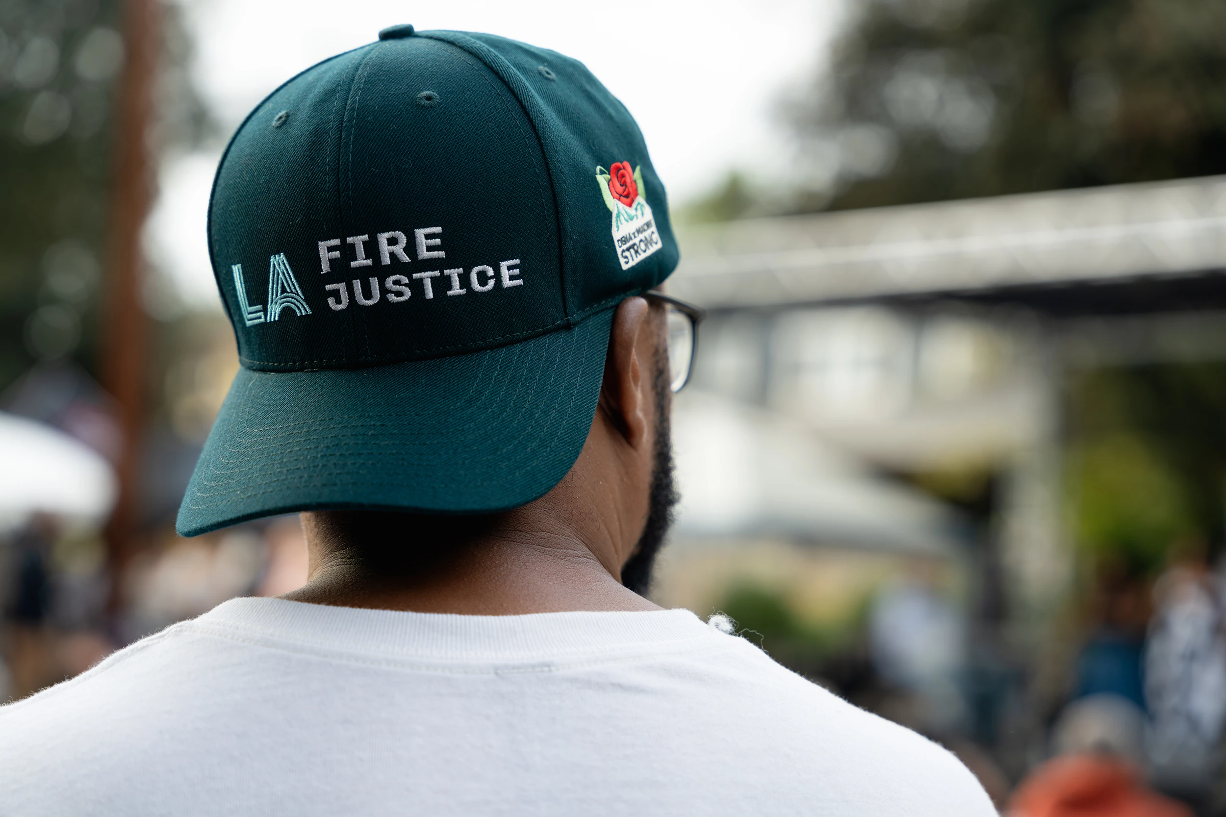 A man wearing LA Fire Justice's hat at Block Party 