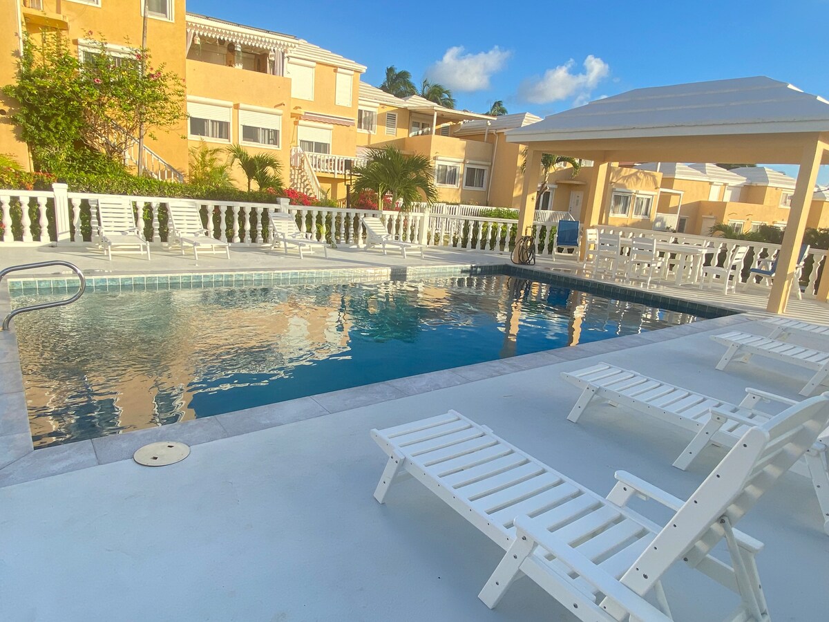 Pool and shaded seating area