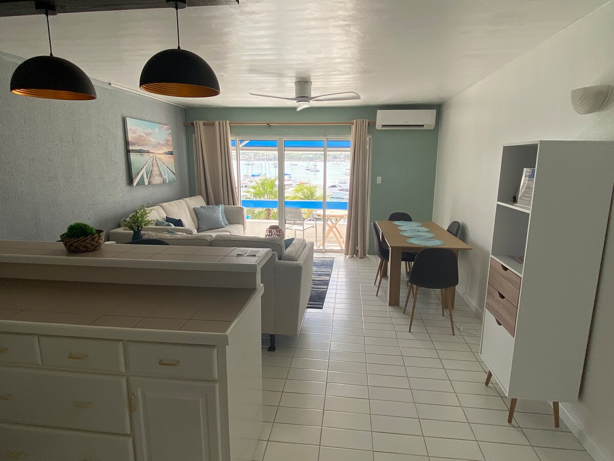 Living and dining area with ocean views