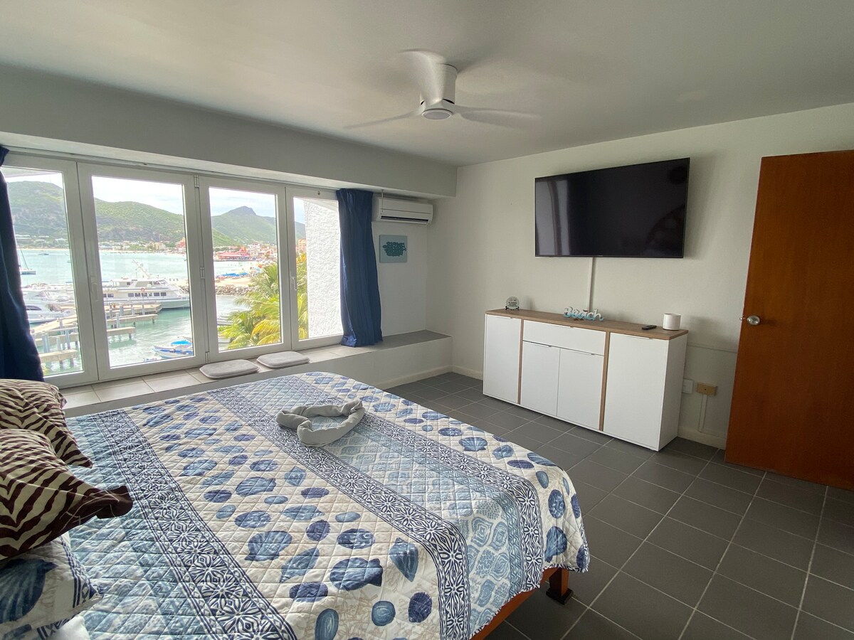 King bedroom with TV