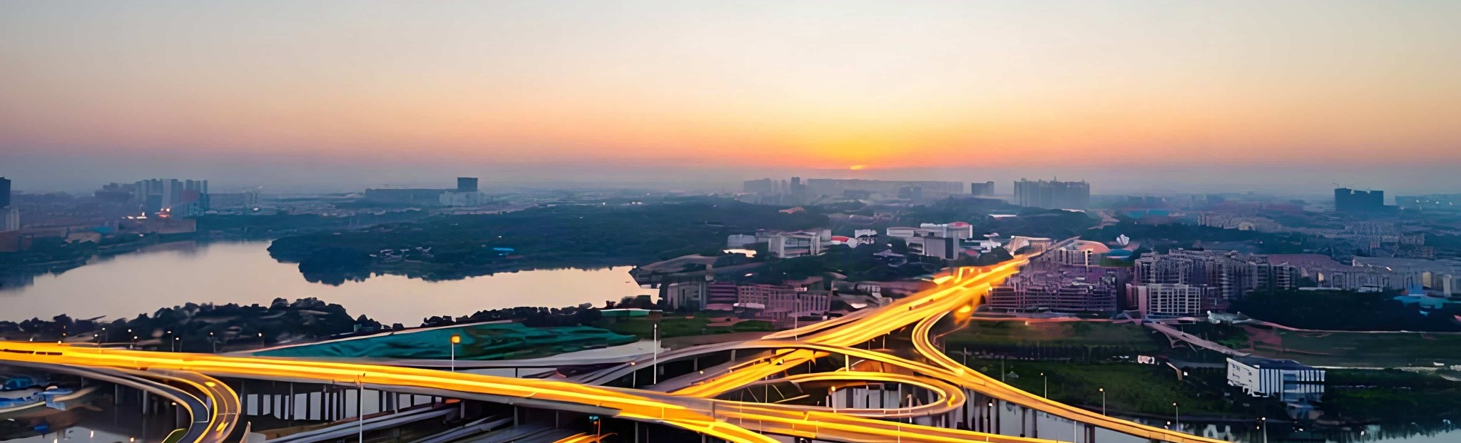 Aerial view of an interconnected motorway network representing global mobility and cross-border connections.