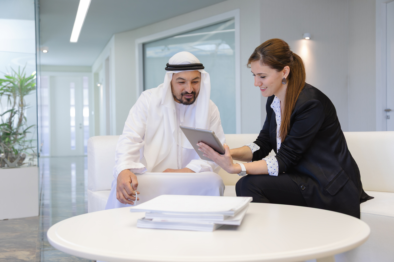 Immigration consultant advising client on UAE visa case review