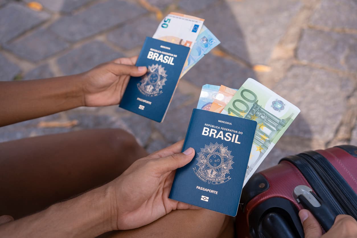 Brazilian passports and travel documents representing electronic temporary visa applications