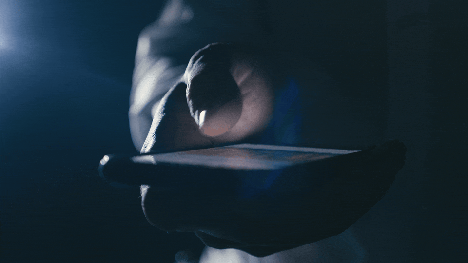 Someone scrolling social media on a cellphone