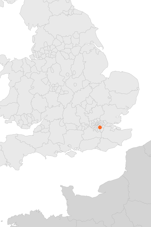 Map of southern England and northern France with an orange dot near London in England.