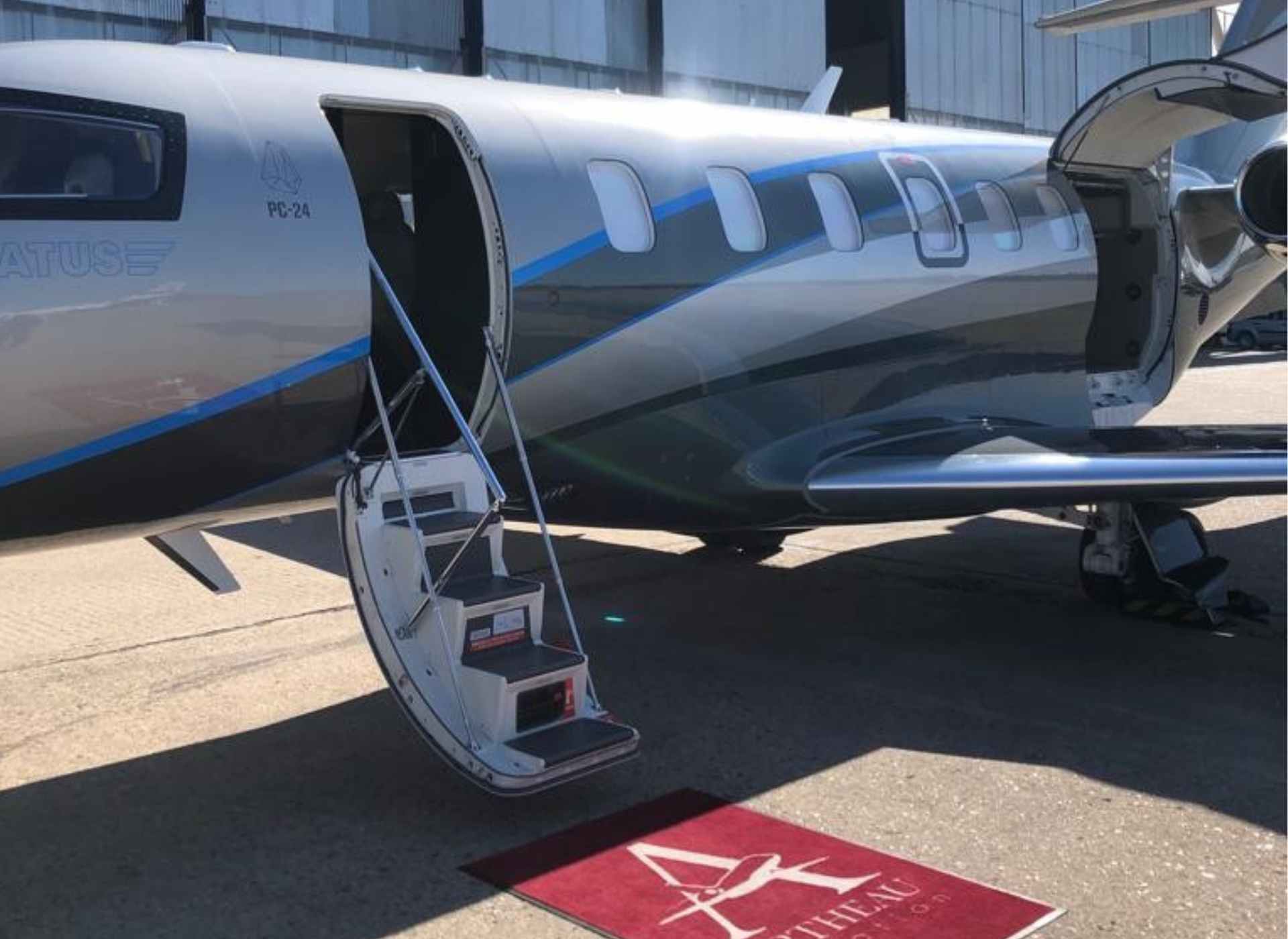 Pilatus PC24 with red carpet