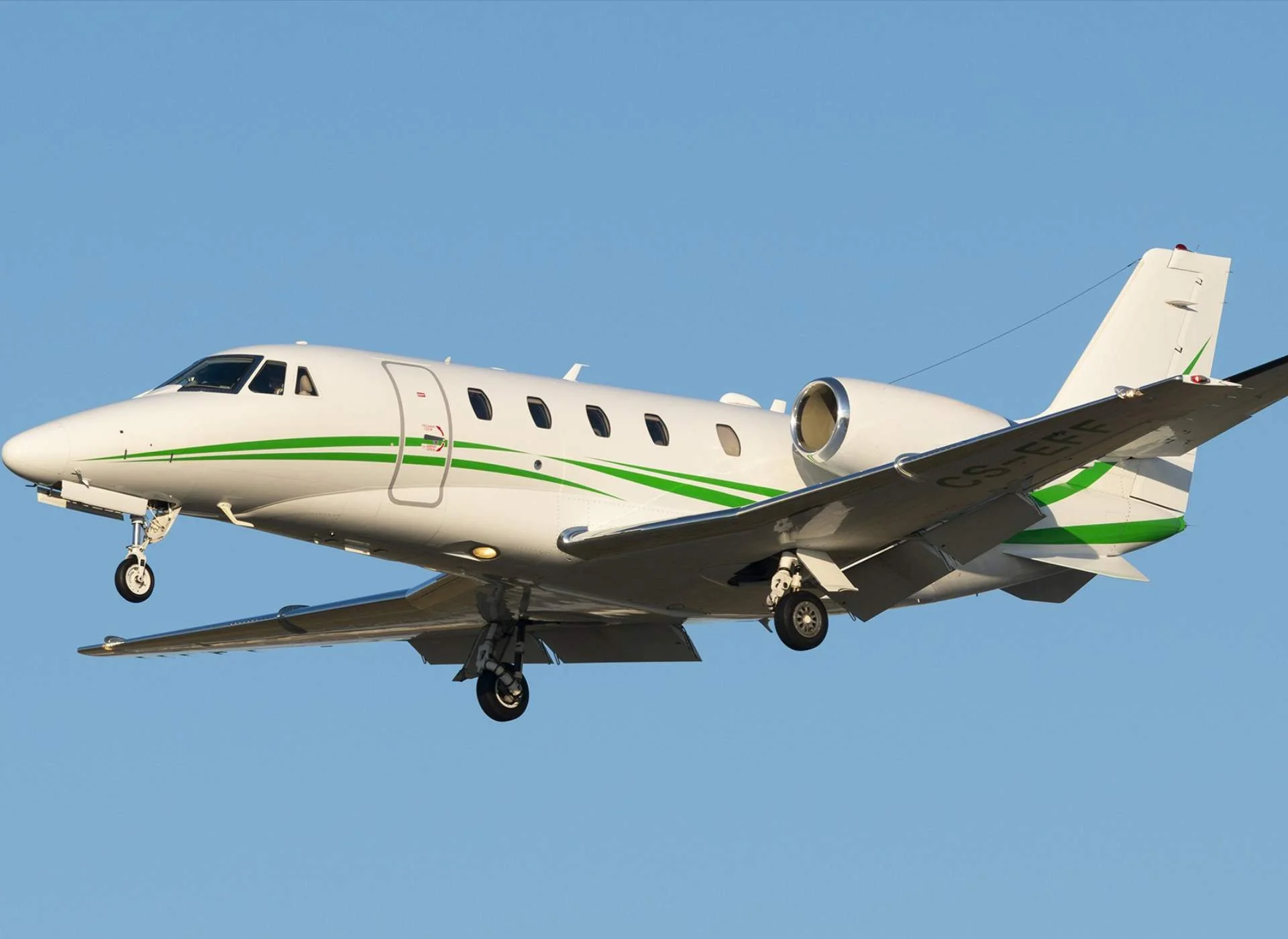 Citation XLS+ in flight in blue sky