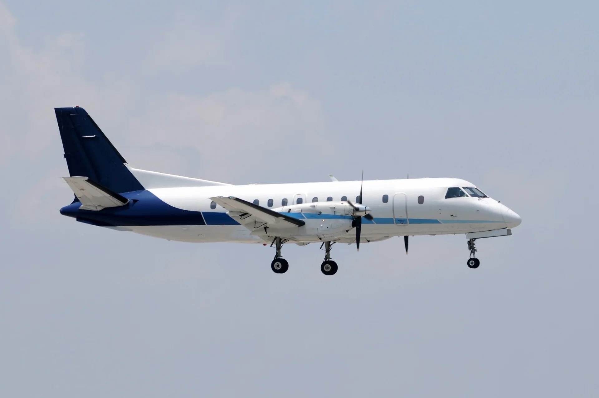 Side view of a Saab 340 aircraft during a private charter flight