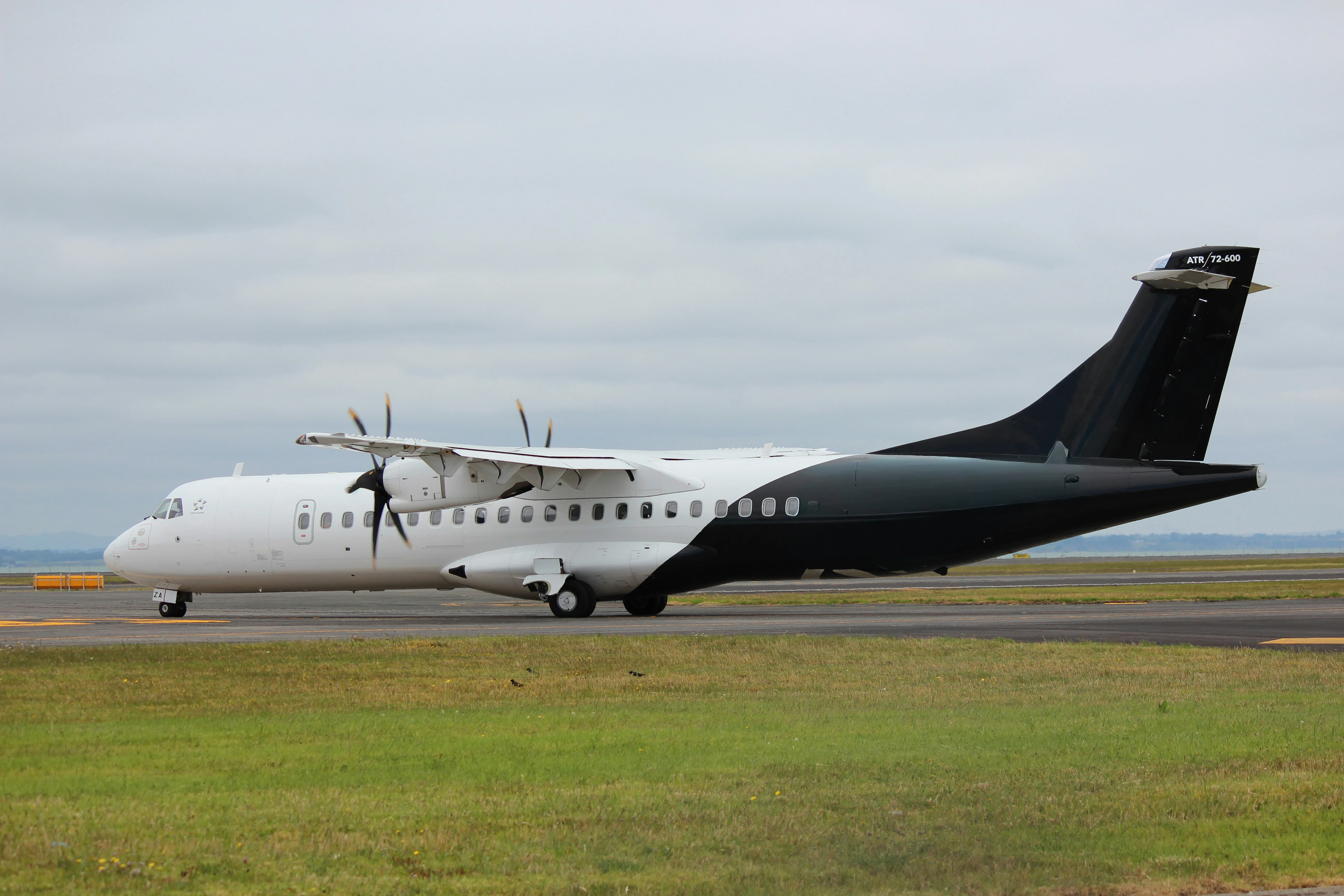 ATR 72 turboprop aircraft taxiing on the apron