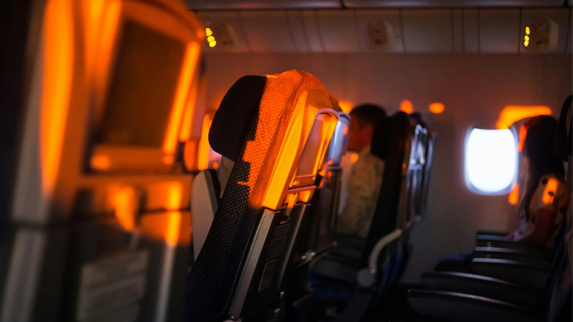 Passenger aircraft cabin at sunset