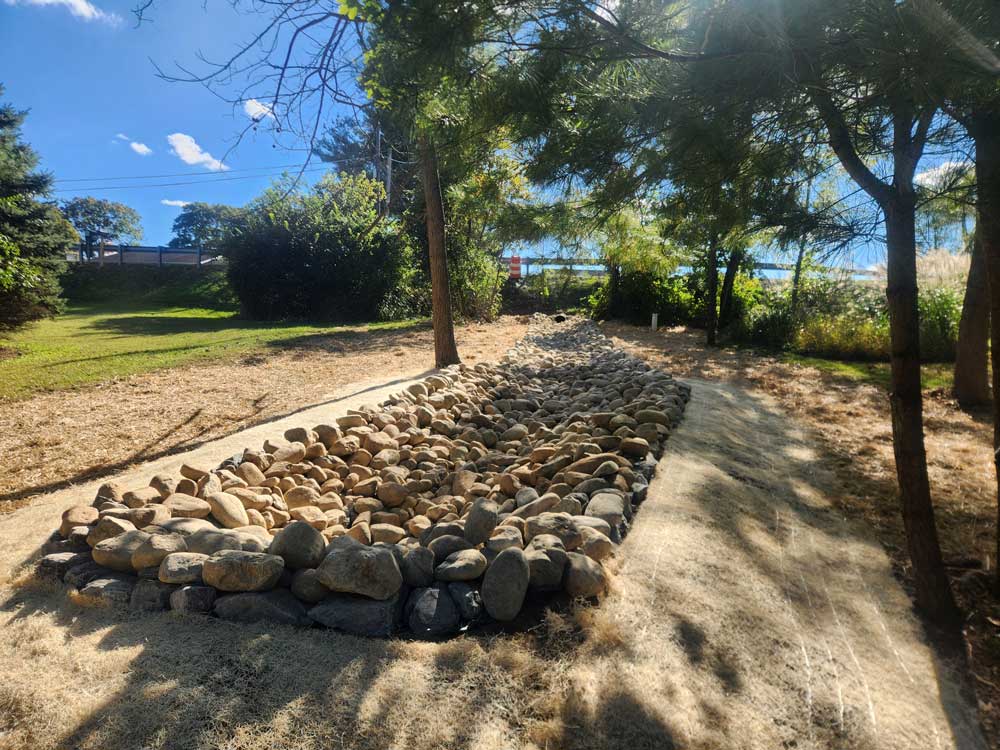 a large drainage site filled with rocks
