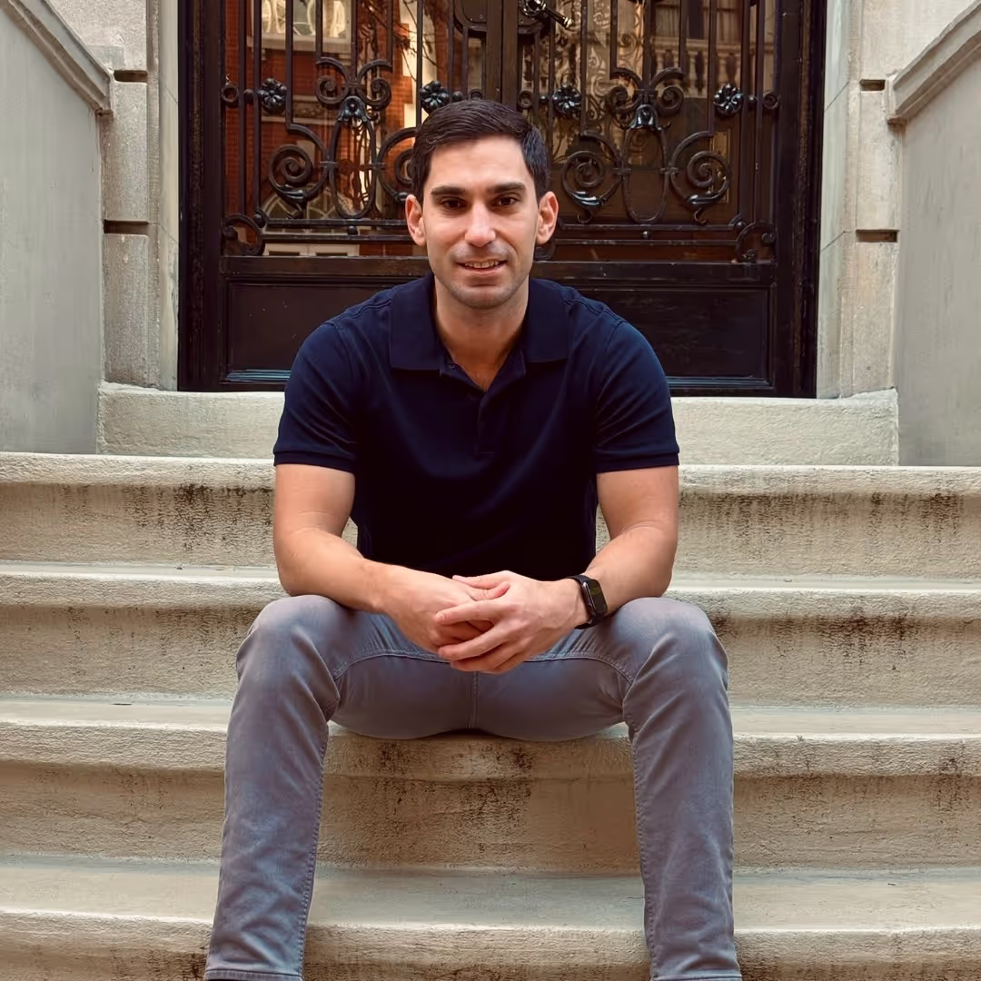 Chris sitting on stairs