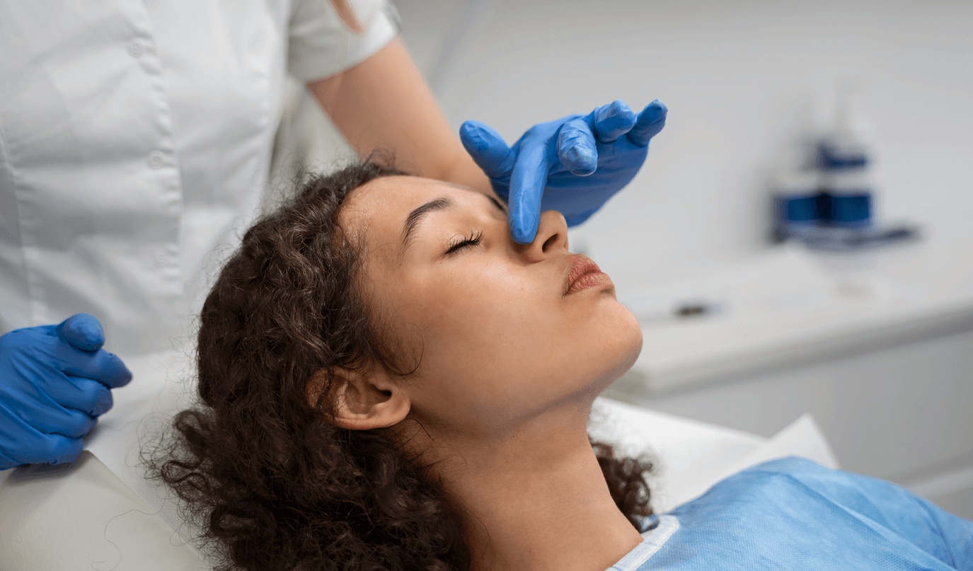 Patient undergoing nasal examination before surgery with the best septoplasty surgeon in Los Angeles.