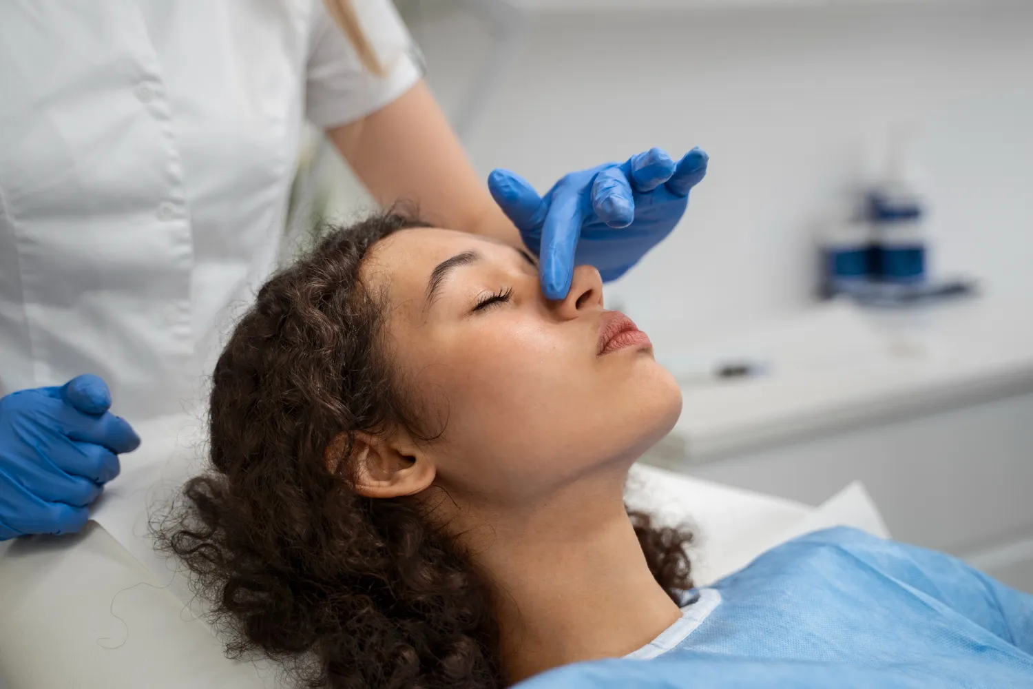 Patient undergoing nasal examination before surgery with the best septoplasty surgeon in Los Angeles.