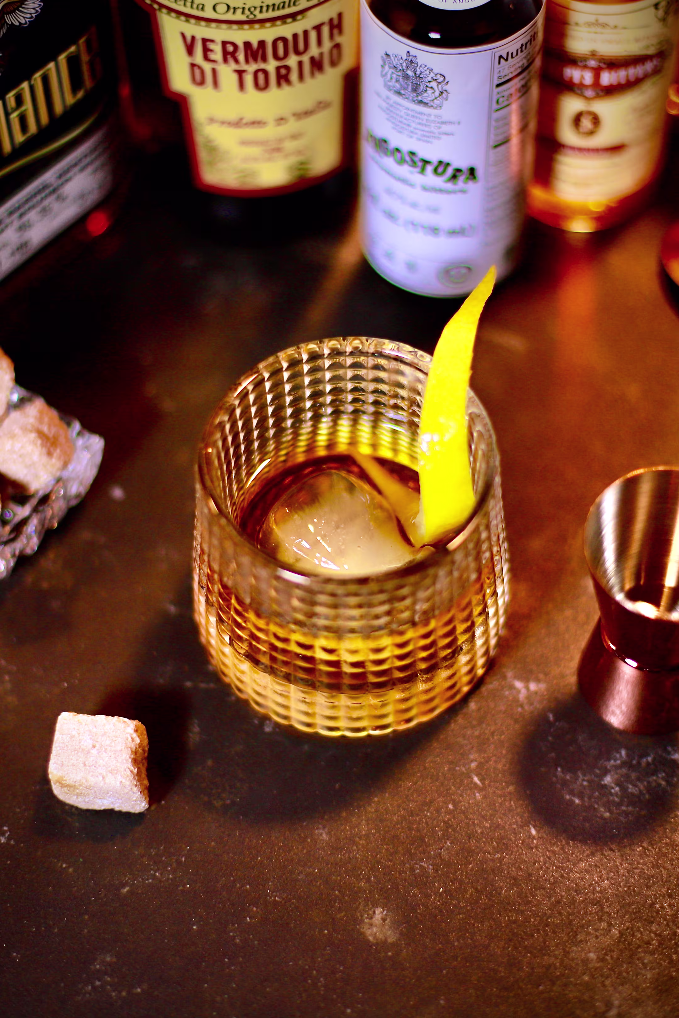 An old fashioned cocktail served in a rocks glass