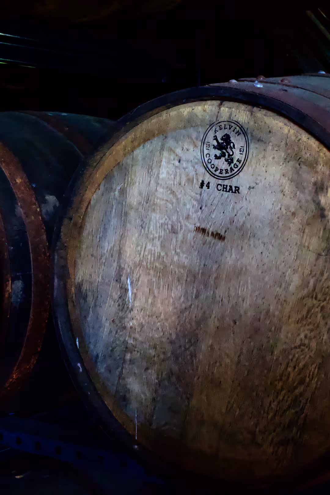 Close up of a Kelvin Cooperage bourbon barrel head stamped with number 4 char.