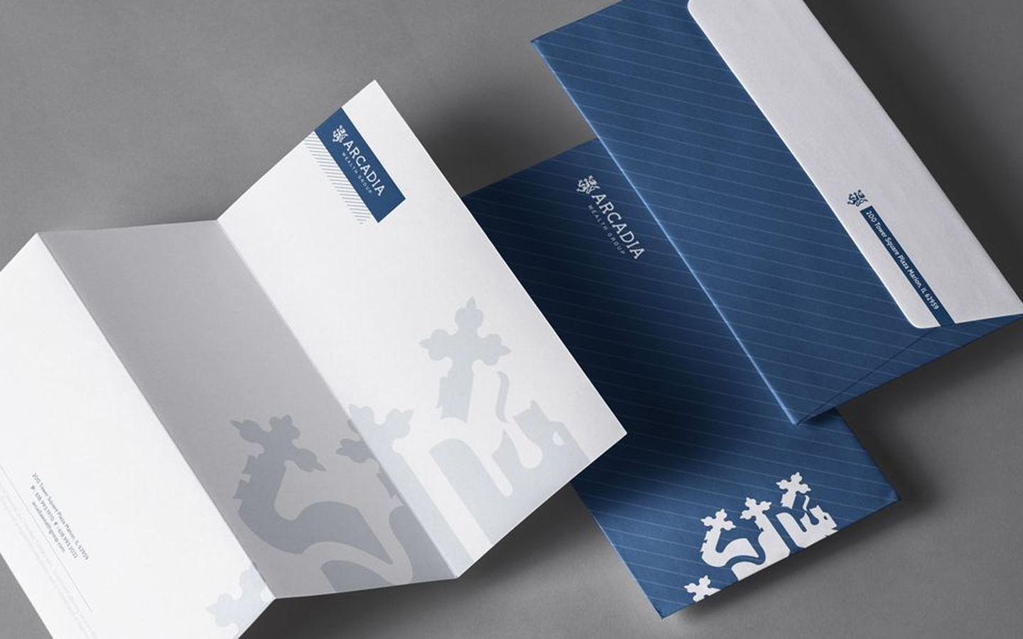 a mockup of stationary for arcadia wealth group